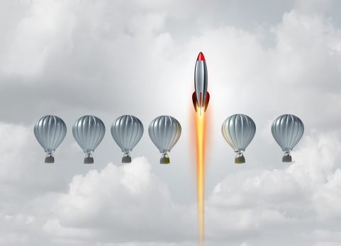 A rocket shooting out from between hot air balloons as an allegory to digital advantage